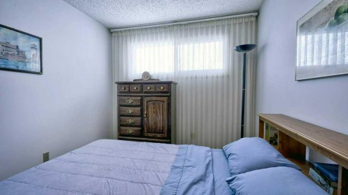 103 Rundlehorn Crescent Ne, Calgary, AB - Indoor Photo Showing Bedroom