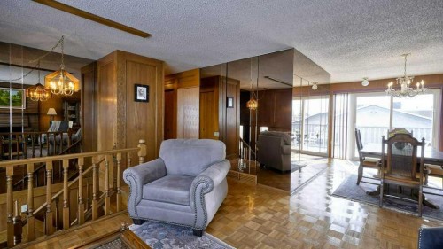 103 Rundlehorn Crescent Ne, Calgary, AB - Indoor Photo Showing Living Room