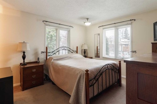 3035 Cedar Ridge Drive Sw, Calgary, AB - Indoor Photo Showing Bedroom