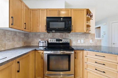 66 Auburn Bay Crescent Se, Calgary, AB - Indoor Photo Showing Kitchen