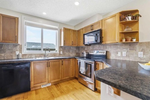 66 Auburn Bay Crescent Se, Calgary, AB - Indoor Photo Showing Kitchen