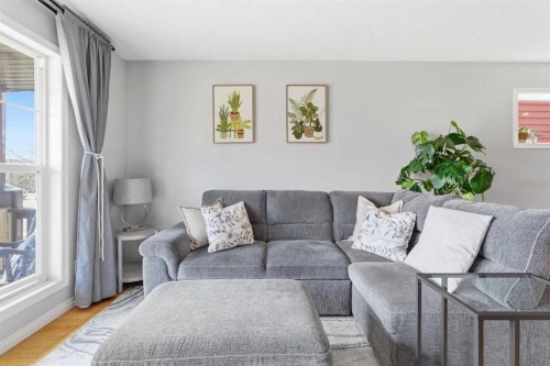 66 Auburn Bay Crescent Se, Calgary, AB - Indoor Photo Showing Living Room