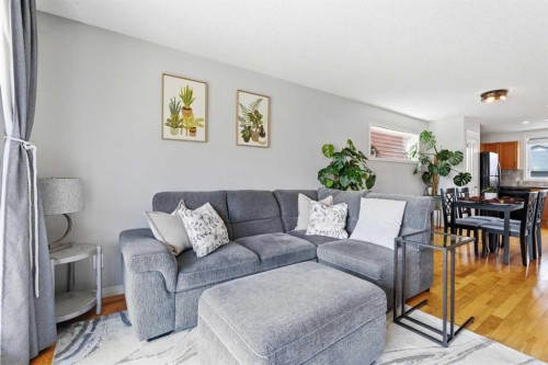 66 Auburn Bay Crescent Se, Calgary, AB - Indoor Photo Showing Living Room