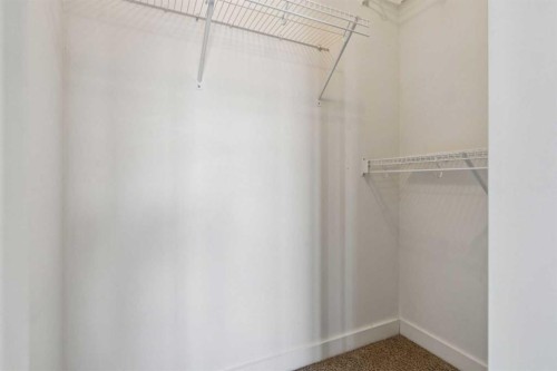 2107-175 Silverado Boulevard Sw, Calgary, AB - Indoor With Storage
