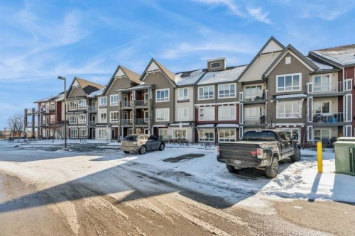 2107-175 Silverado Boulevard Sw, Calgary, AB - Outdoor With Balcony With Facade
