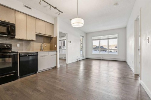 2107-175 Silverado Boulevard Sw, Calgary, AB - Indoor Photo Showing Kitchen