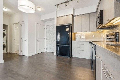 2107-175 Silverado Boulevard Sw, Calgary, AB - Indoor Photo Showing Kitchen With Upgraded Kitchen