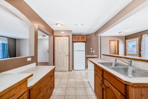 11 Coventry Link Ne, Calgary, AB - Indoor Photo Showing Kitchen With Double Sink