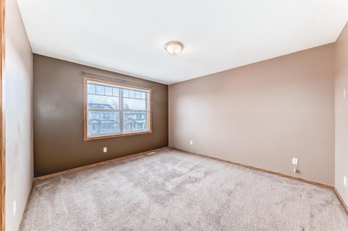 11 Coventry Link Ne, Calgary, AB - Indoor Photo Showing Other Room