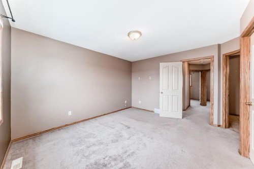11 Coventry Link Ne, Calgary, AB - Indoor Photo Showing Other Room