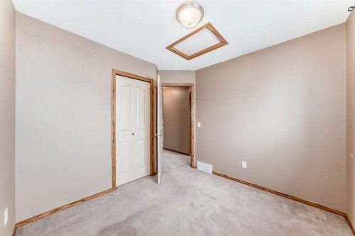 11 Coventry Link Ne, Calgary, AB - Indoor Photo Showing Other Room