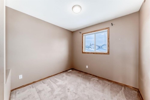 11 Coventry Link Ne, Calgary, AB - Indoor Photo Showing Other Room