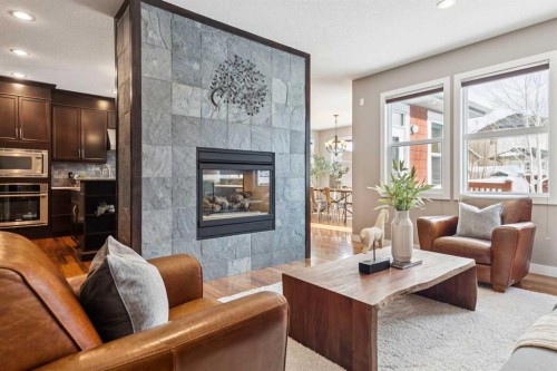 25 Mahogany Square Se, Calgary, AB - Indoor Photo Showing Living Room With Fireplace