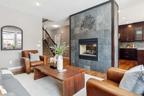 25 Mahogany Square Se, Calgary, AB - Indoor Photo Showing Living Room With Fireplace