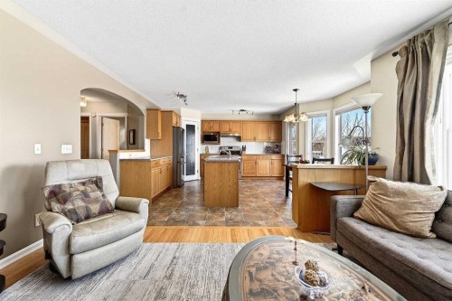 219 Hidden Ranch Circle Nw, Calgary, AB - Indoor Photo Showing Living Room