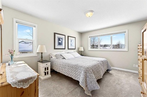 219 Hidden Ranch Circle Nw, Calgary, AB - Indoor Photo Showing Bedroom