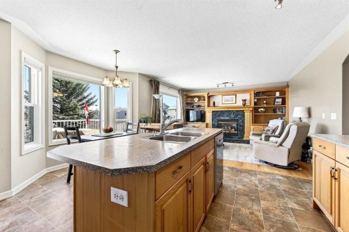 219 Hidden Ranch Circle Nw, Calgary, AB - Indoor With Fireplace