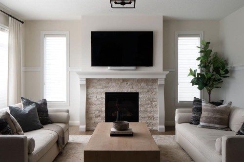 665 Legacy Woods Circle Se, Calgary, AB - Indoor Photo Showing Living Room With Fireplace
