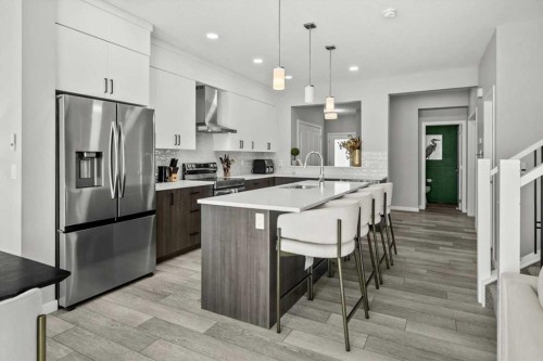 243 Silver Spruce Grove Sw, Calgary, AB - Indoor Photo Showing Kitchen With Stainless Steel Kitchen With Upgraded Kitchen