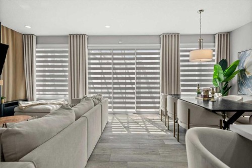 243 Silver Spruce Grove Sw, Calgary, AB - Indoor Photo Showing Living Room