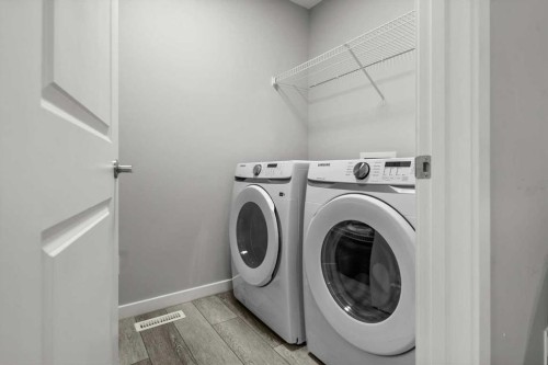 243 Silver Spruce Grove Sw, Calgary, AB - Indoor Photo Showing Laundry Room