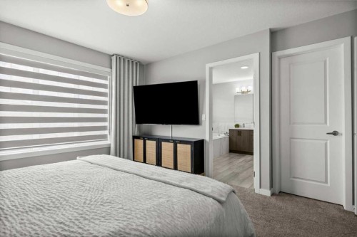 243 Silver Spruce Grove Sw, Calgary, AB - Indoor Photo Showing Bedroom