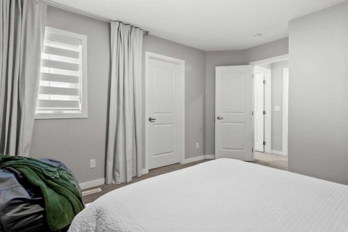 243 Silver Spruce Grove Sw, Calgary, AB - Indoor Photo Showing Bedroom
