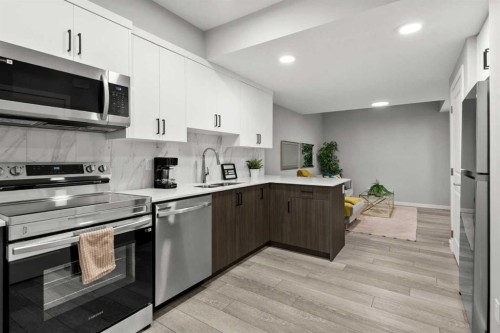 243 Silver Spruce Grove Sw, Calgary, AB - Indoor Photo Showing Kitchen With Stainless Steel Kitchen With Upgraded Kitchen