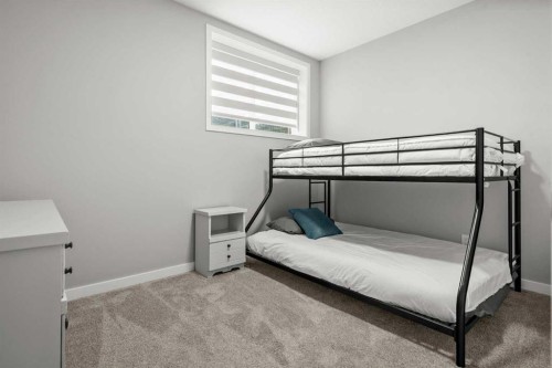 243 Silver Spruce Grove Sw, Calgary, AB - Indoor Photo Showing Bedroom