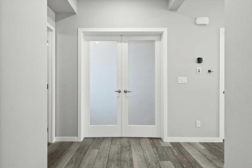 243 Silver Spruce Grove Sw, Calgary, AB - Indoor Photo Showing Other Room