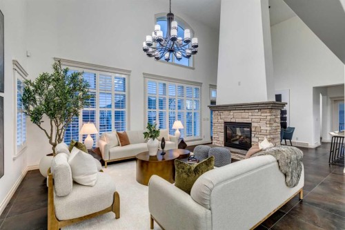 151 Mahogany Bay Se, Calgary, AB - Indoor Photo Showing Living Room With Fireplace