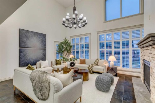 151 Mahogany Bay Se, Calgary, AB - Indoor Photo Showing Living Room With Fireplace