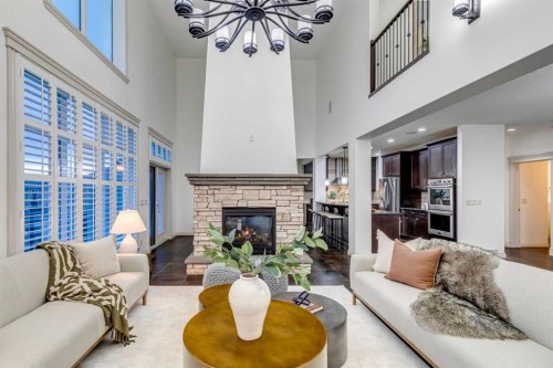 151 Mahogany Bay Se, Calgary, AB - Indoor Photo Showing Living Room With Fireplace