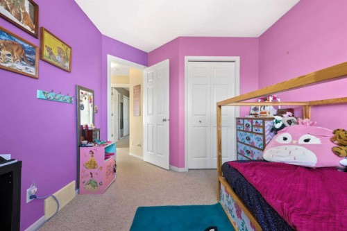 40 Eversyde Circle Sw, Calgary, AB - Indoor Photo Showing Bedroom