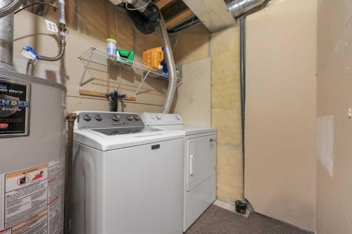 40 Eversyde Circle Sw, Calgary, AB - Indoor Photo Showing Laundry Room