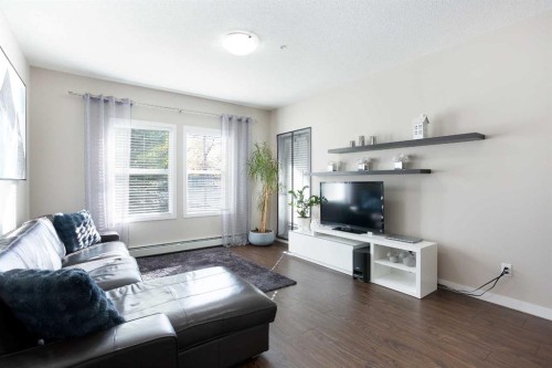 112-200 Cranfield Common Se, Calgary, AB - Indoor Photo Showing Living Room
