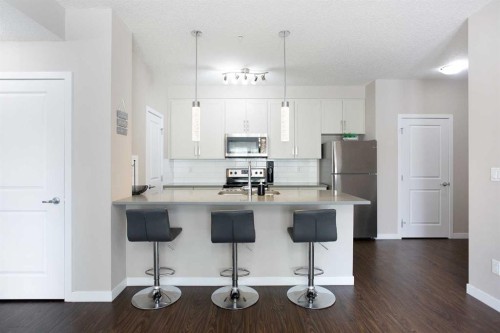 112-200 Cranfield Common Se, Calgary, AB - Indoor Photo Showing Kitchen With Upgraded Kitchen