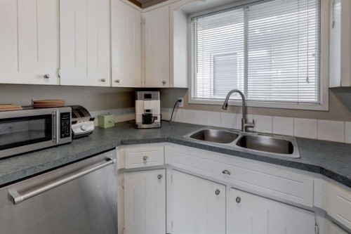 16 Martingrove Mews Ne, Calgary, AB - Indoor Photo Showing Kitchen With Double Sink