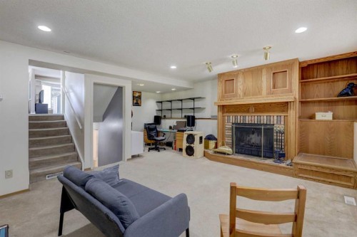 16 Martingrove Mews Ne, Calgary, AB - Indoor With Fireplace