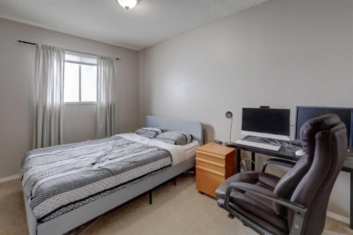 16 Martingrove Mews Ne, Calgary, AB - Indoor Photo Showing Bedroom