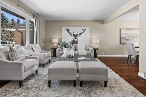 7715 67 Avenue Nw, Calgary, AB - Indoor Photo Showing Living Room