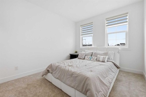 230 Royal Birch View Nw, Calgary, AB - Indoor Photo Showing Bedroom