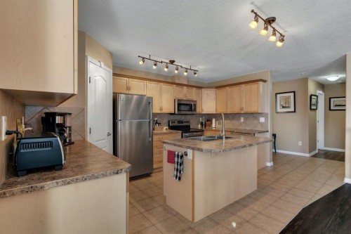 2117-303 Arbour Crest Drive Nw, Calgary, AB - Indoor Photo Showing Kitchen