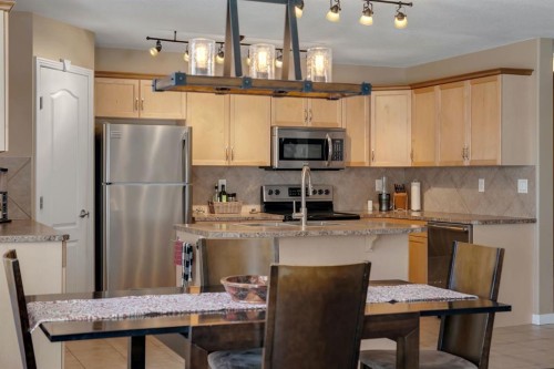 2117-303 Arbour Crest Drive Nw, Calgary, AB - Indoor Photo Showing Kitchen With Stainless Steel Kitchen