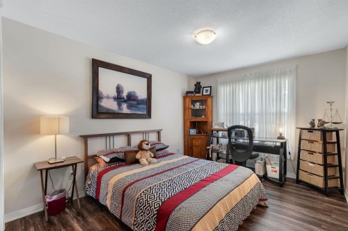 2117-303 Arbour Crest Drive Nw, Calgary, AB - Indoor Photo Showing Bedroom