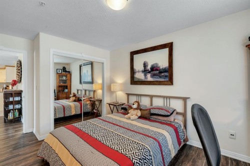 2117-303 Arbour Crest Drive Nw, Calgary, AB - Indoor Photo Showing Bedroom