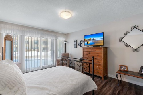2117-303 Arbour Crest Drive Nw, Calgary, AB - Indoor Photo Showing Bedroom