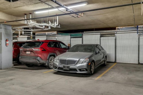 2117-303 Arbour Crest Drive Nw, Calgary, AB - Indoor Photo Showing Garage