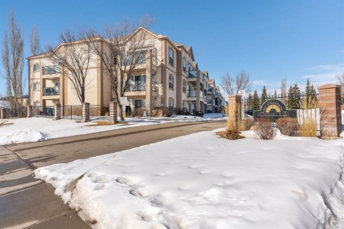 2117-303 Arbour Crest Drive Nw, Calgary, AB - Outdoor With Facade