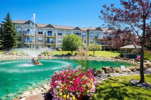 2117-303 Arbour Crest Drive Nw, Calgary, AB - Outdoor With Body Of Water